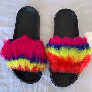 Women’s Size 11, unworn, brand new slides; still smell brand new, multi-rainbow